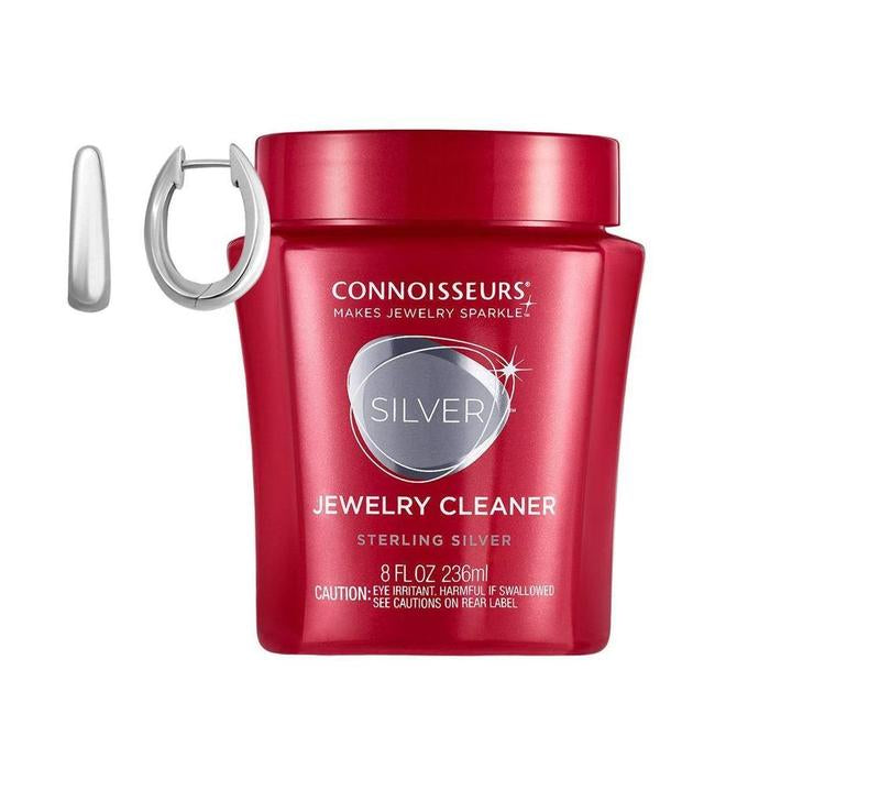 Connoisseurs 8 fl oz red jar of silver jewellery cleaner for restoring shine to sterling silver earrings and accessories.
