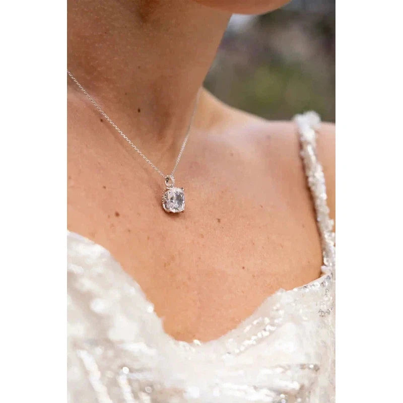 Georgini Sydney Soiree Elaine cushion-cut cubic zirconia pendant in rhodium-plated sterling silver on a delicate chain.