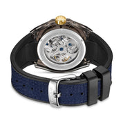 Police Spider-Sense automatic watch with exhibition case back, gold crown, and blue canvas-fused black silicone strap.