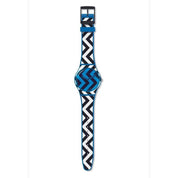 Swatch BLUZAG watch featuring a blue silicone strap and dial with a bold black and white zigzag pattern, 41mm round case.