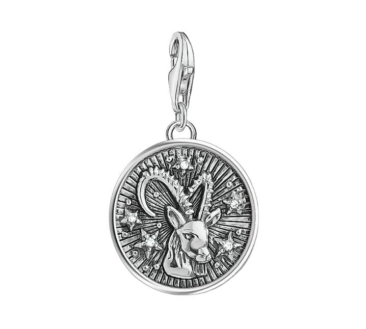 Thomas Sabo sterling silver Capricorn charm featuring a detailed goat motif, sparkling star accents, and a secure lobster clasp.