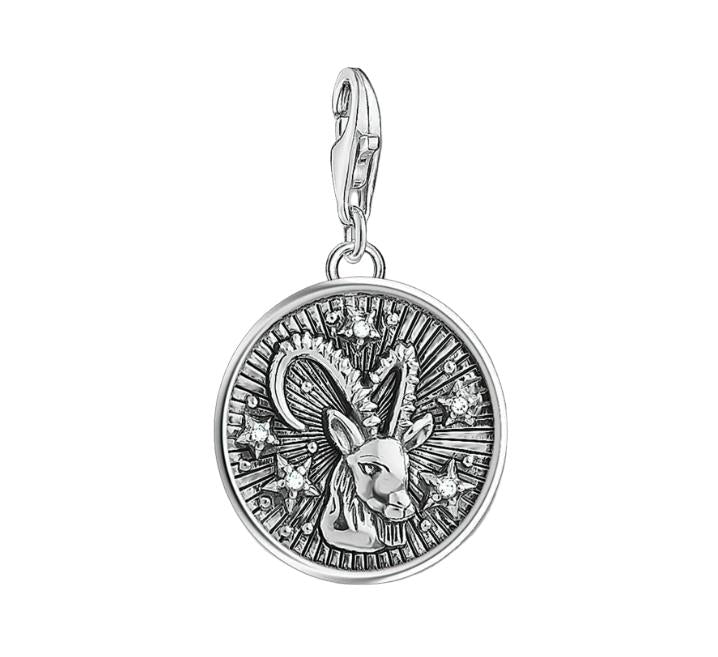 Thomas Sabo sterling silver Capricorn charm featuring a detailed goat motif, sparkling star accents, and a secure lobster clasp.