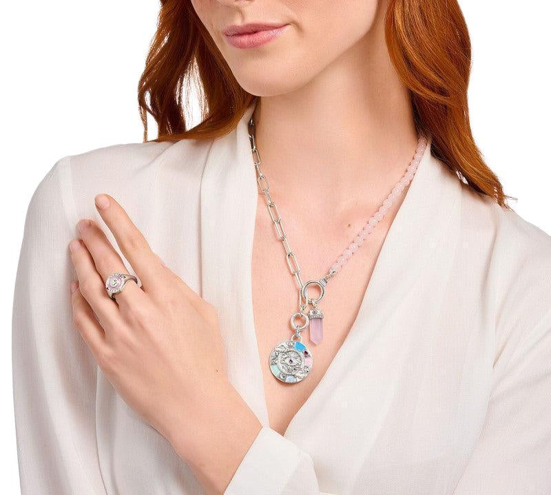 Thomas Sabo necklace featuring recycled silver links, rose quartz beads, and stone-studded ring closures for custom pendants.
