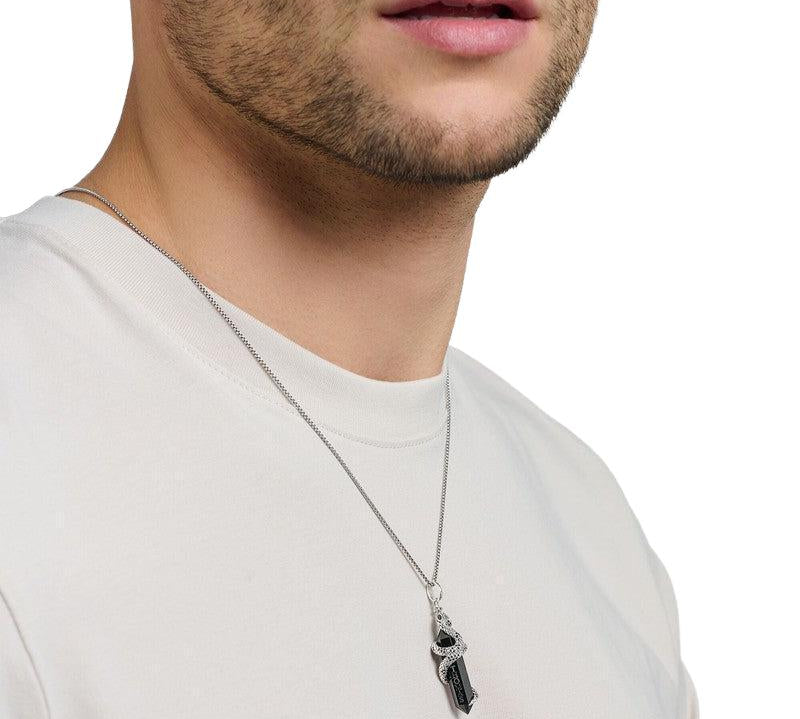 Thomas Sabo blackened sterling silver snake pendant with hexagonal onyx and sparkling black zirconia stones on a silver chain.