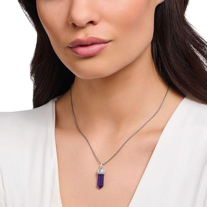 Thomas Sabo blackened silver pendant featuring a hexagonal imitation amethyst with cosmic star and moon symbols on a chain.