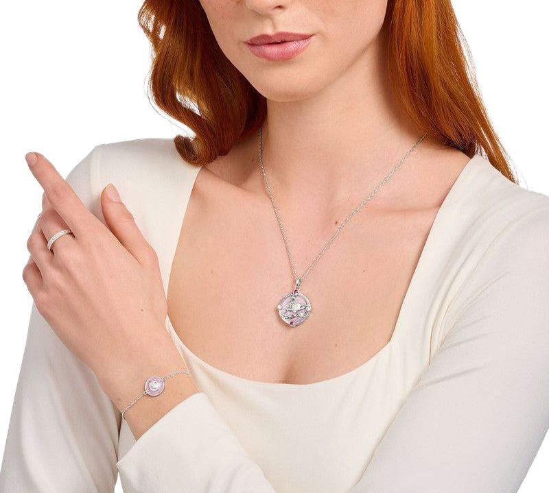 Thomas Sabo cosmic pendant in gold-plated silver with rose quartz, pink zirconia, and mystical celestial symbols.