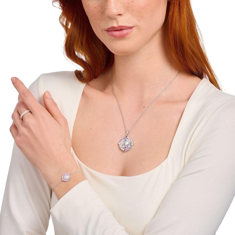 Thomas Sabo cosmic pendant in gold-plated silver with rose quartz, pink zirconia, and mystical celestial symbols.