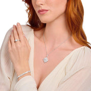 Thomas Sabo silver pendant featuring a central octagon-cut white zirconia stone surrounded by pear and round-cut accents.